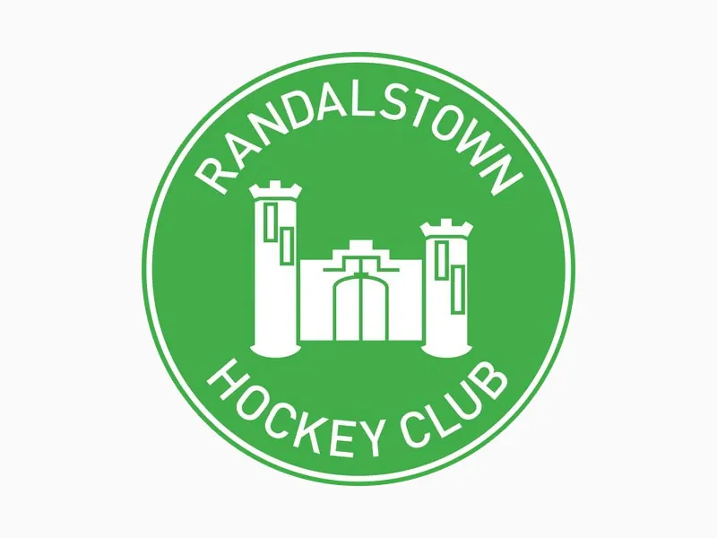 Randalstown Hockey Club green circular crest showing a castle gateway